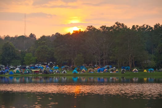 touristic camp at the evening by the lake