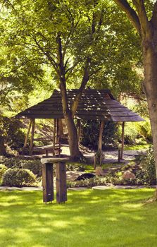 An arbor in a summer japanese style garden