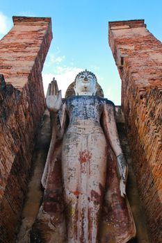 Ancient buddha in Sukhothai Historical Park in Thailand