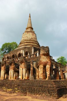 Elephant statue around pagoda at temple in Sukhothai, Thailand