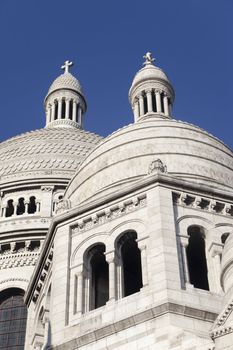 Basilica of the Sacre Coeur in Montmartre Paris under pure blue sky