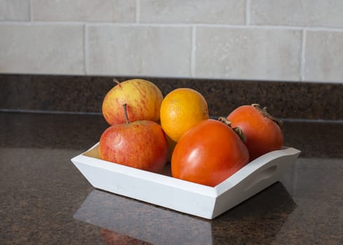 apples oranges kakhi and other fruit