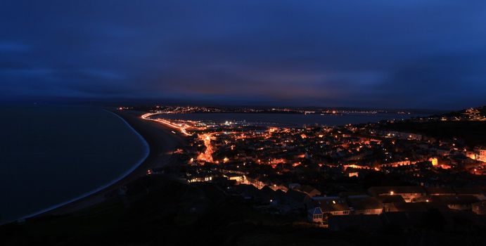 Street lights light up the causway at Chesil Beach Fortuneswell Portland Dorset