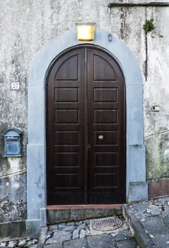 italian door in small village, Italy