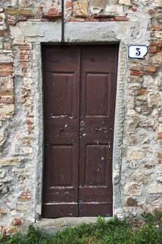 italian door in small village, Italy