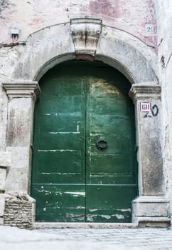 italian door in small village, Italy