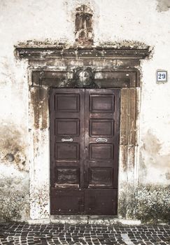 italian door in small village, Italy