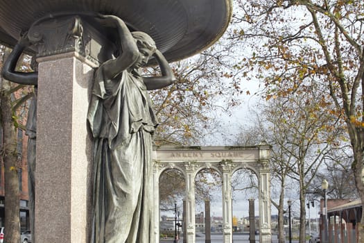 Skidmore Fountain with Bronze Woman Sculpture in Ankeny Square Oldtown Portland Oregon circa 1888