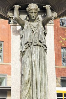 Skidmore Fountain with Bronze Woman Sculpture closeup in Oldtown Portland Oregon circa 1888