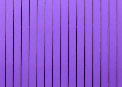 Wood background in vertical pattern,  purple color.