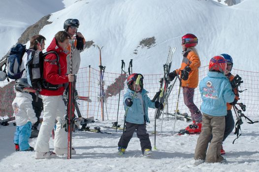 Montain ski resort near Sion, Swetzeland - March 2007. Mountain skiers prepare for descent.