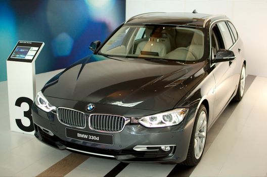 MUNICH - SEPTEMBER 19: New model BMW 330d at BMW Welt Expo center on September 19, 2012 in Munich.