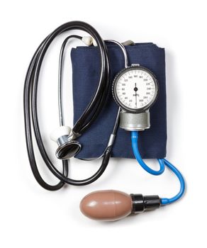 Manual aneroid sphygmomanometer with stethoscope on white background