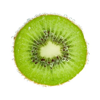 Kiwifruit slice in water with bubbles on white background