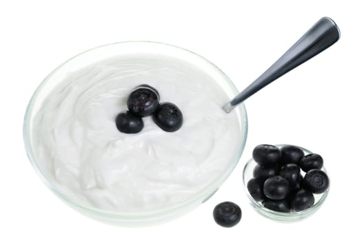 Yogurt bowl with spoon and Blueberries on white background