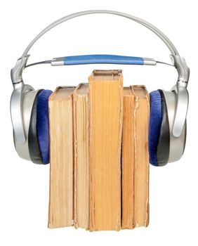HI-Fi headphones on old books row isolated on white background
