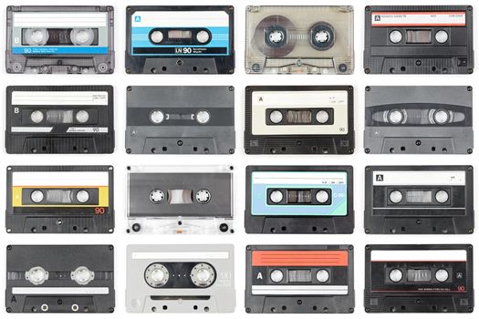 Collection of vintage Compact Cassettes on white background