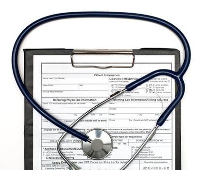 Blank Patient information on clipboard with stethoscope on white background