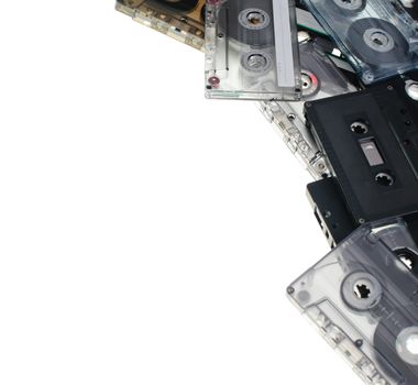Heap of Compact Cassettes on white background