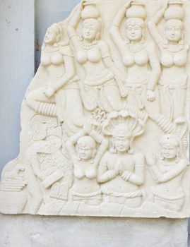 SURAT THANI, THAILAND - MARCH 17 : Ancient art on temple wall at Suanmokkh temple on March 17, 2012 in Surat Thani, Thailand.