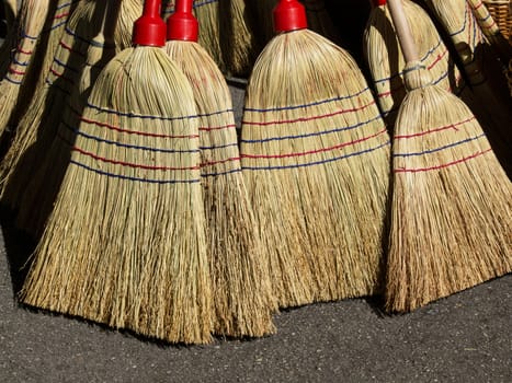 lot of brooms redy for use