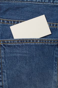 A denium blue jean pocket witn business card