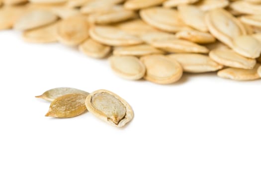 Pumpkin seeds isolated on the white background