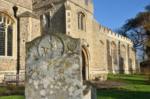 Gravestone in front of church