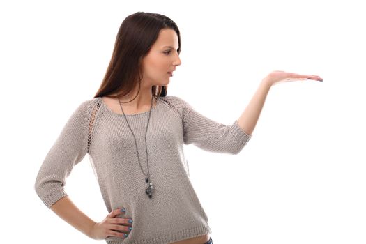 Beautiful girl posing with empty palm over a white background