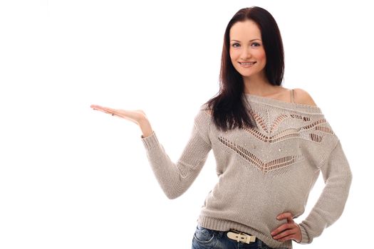 Beautiful and attractive girl showing open palm over a white background