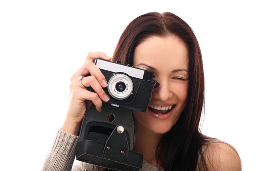 Young and pretty girl with photo camera in hands