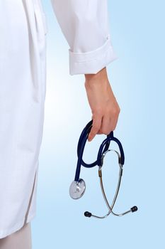 Portrait of happy successful young female doctor holding a stethoscope