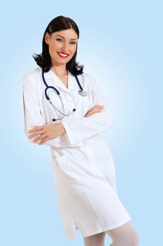 Portrait of happy successful young female doctor holding a stethoscope