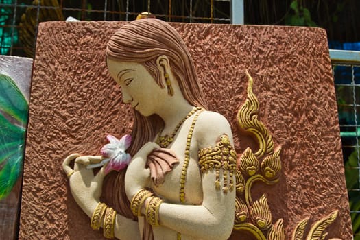 a picture carves a stone , at Thai technician does for decorate to decorate a house where has see a lot various kinds of ,