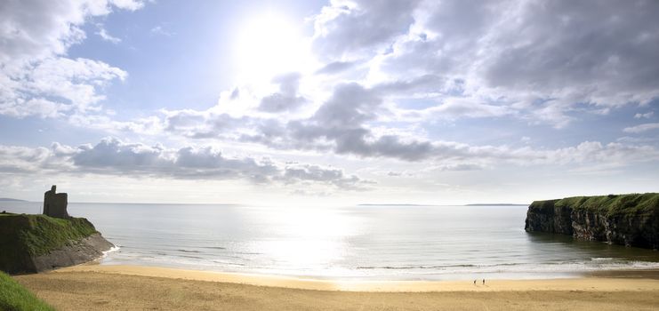 panorama of a Beautiful bright sun over the Ballybunion beach and castle in Ireland one summers day