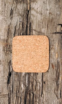 cork memory board on old wooden background