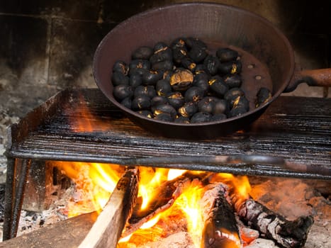 rosted chestnuts in the fireplace