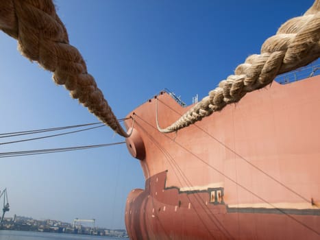 ropes on the bow on a new ship in the shipyard