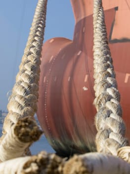 
ropes on the Bulbous bow of dry cargo ship docked in harbor