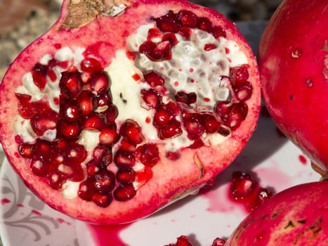pomegranate and seeds on the plate