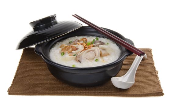 Porridge, abalone & chicken Porridge (congee) served in claypot