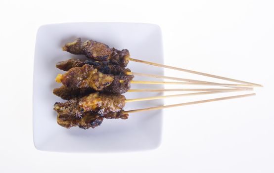 Satay. Asian cuisine - Satay on a background