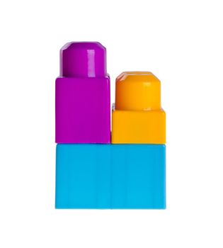 Plastic building blocks on a background