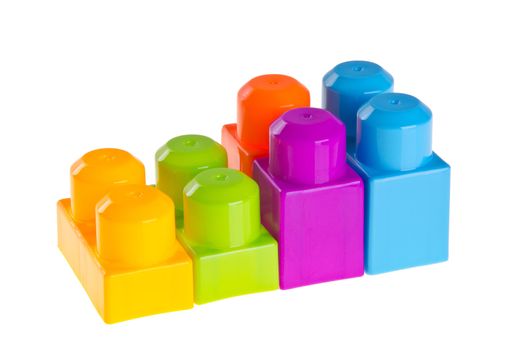 Plastic building blocks on a background