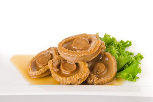 Abalones. Chinese cuisine abalone on the background.