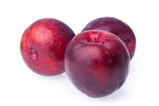 Plum. Ripe plum fruit on the background