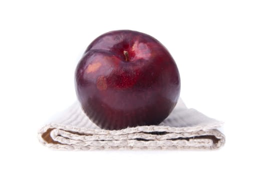 Plum. Ripe plum fruit on the background