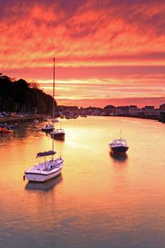 Entrance to weymouth harbour at dusk in southern england