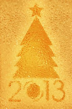 Closeup shot of Christmas tree crystal golden background