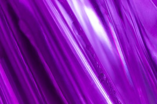 close-up shot of a abstract violet glass background